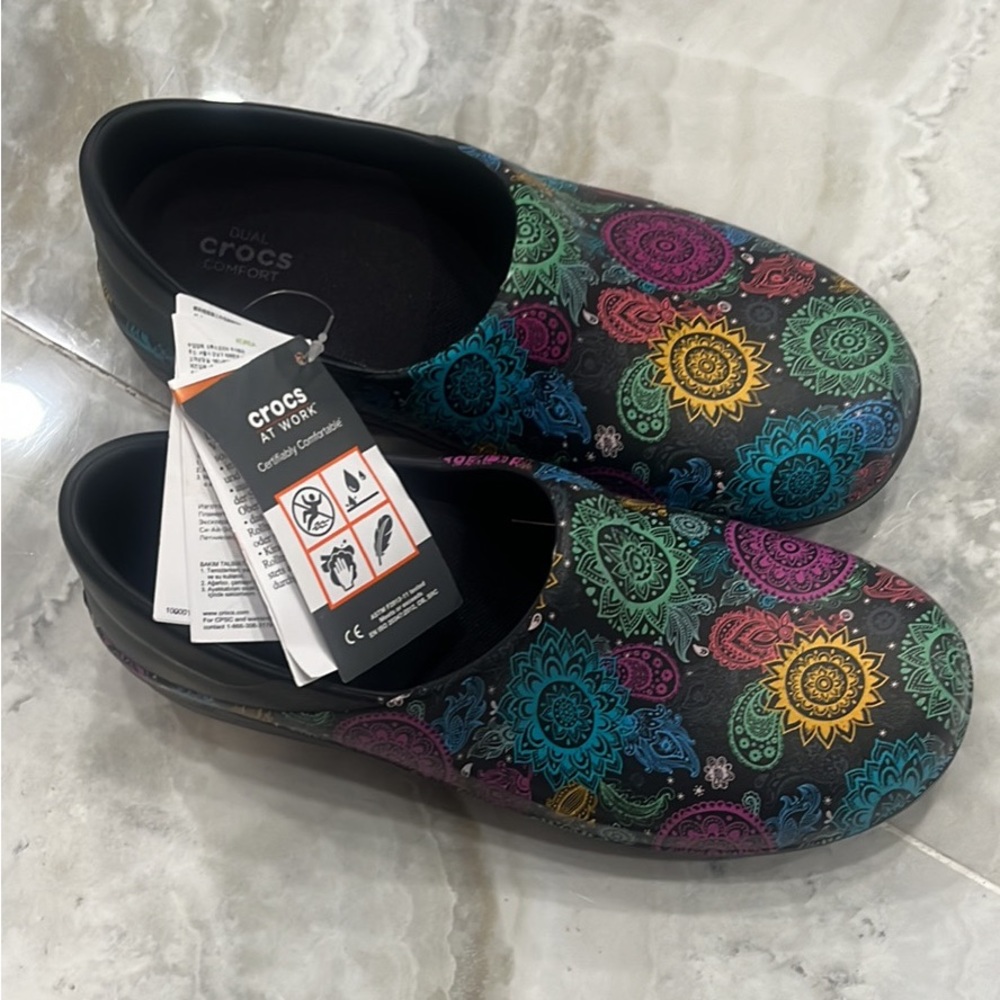 croc clogs with tag